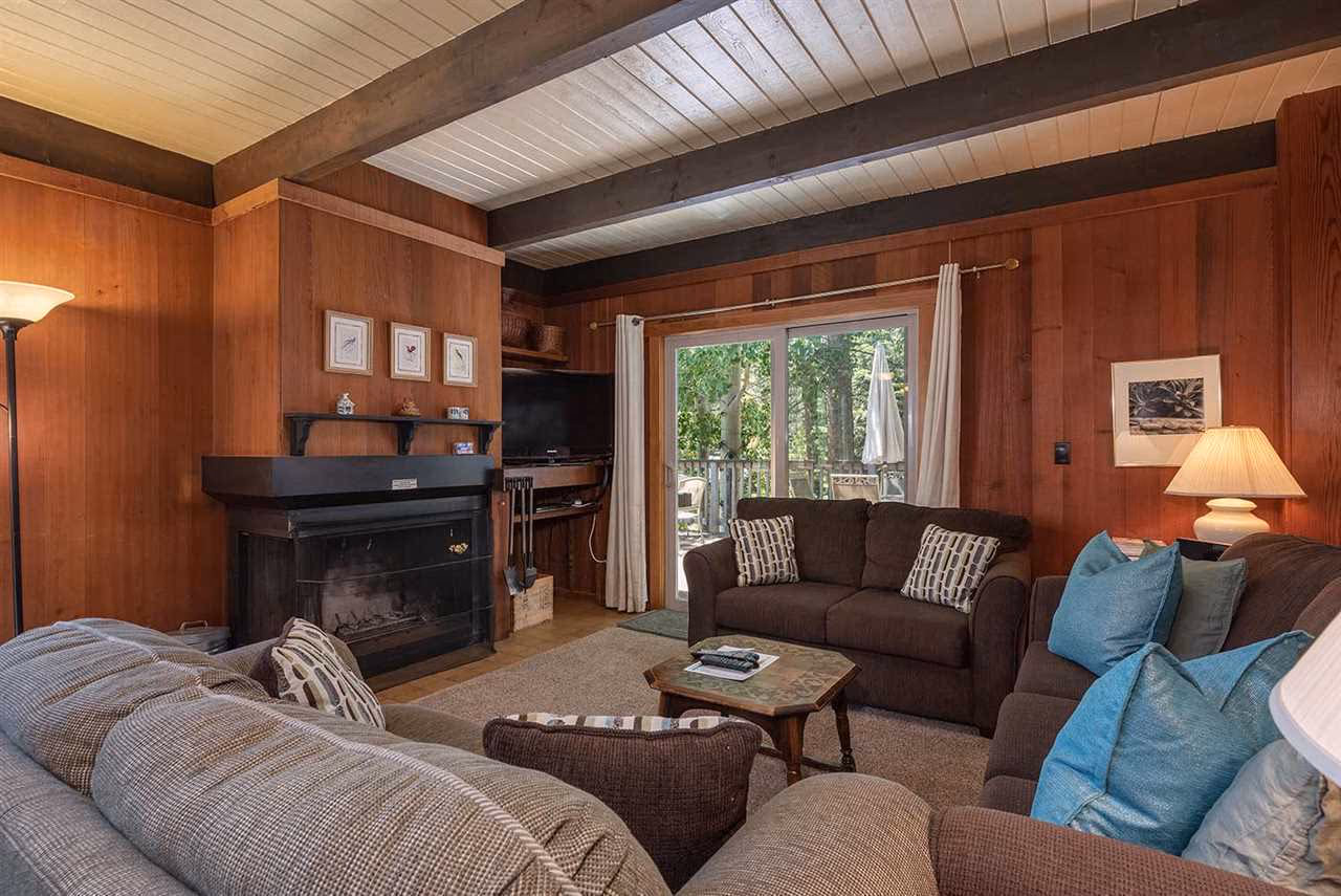 Living room at the Olympic Valley cabin — crew coordination space