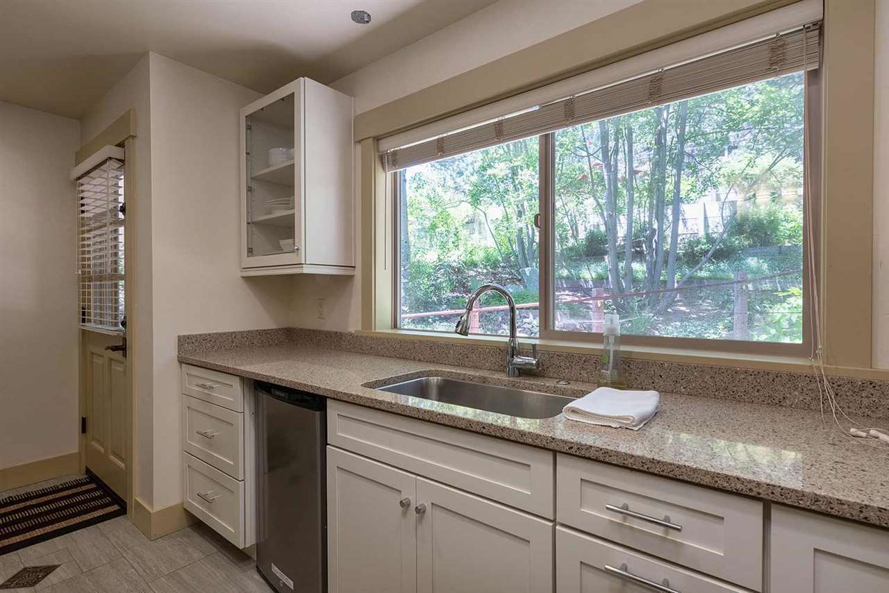 Full kitchen at the Palisades Tahoe Studio — cook in and save during your workation